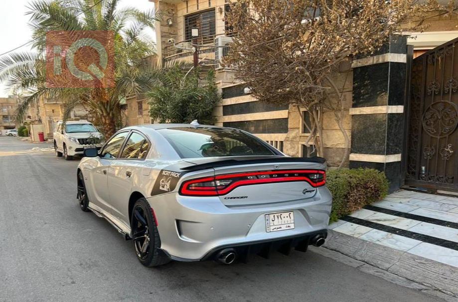 دۆج چارجەر